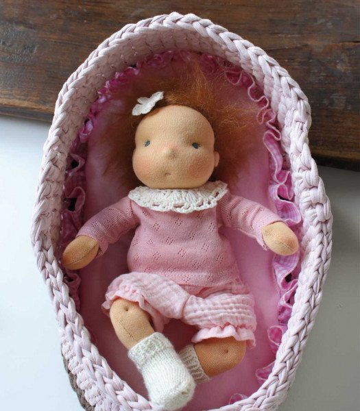 Adorable doll's bassinet