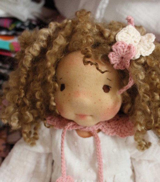 Doll to cuddle or to collect!
