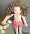 Doll sold with her swimming costume!