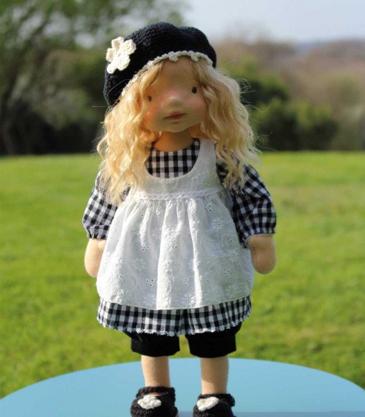 Sculpted wool doll