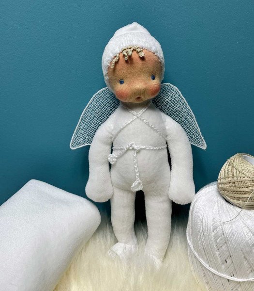 Petite poupée doudou