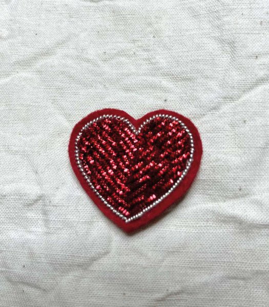 Thread embroidered brooch
