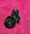 Broche doublée cuir